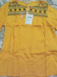 Branded Yellow Short Kurti Type Top.