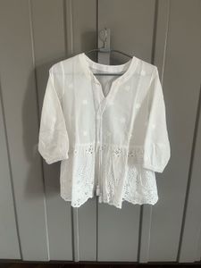 White Embroidered Peplum Top