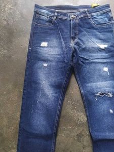 Ripped Blue Denim Jeans