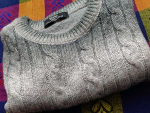 Stylish grey and white sweater