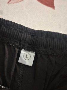 black short L size , new but i lose its tag,