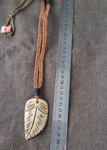 Ooak hand carved bone leaf pendent Necklace