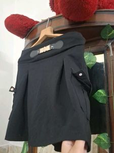 Black Mini Skirt with Buckle Detail