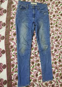 A ripped n patch jeans