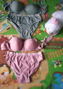 Two matching bra and panty sets