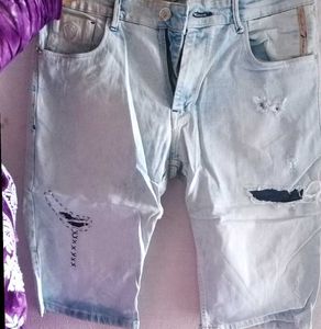 Distressed Denim Jeans