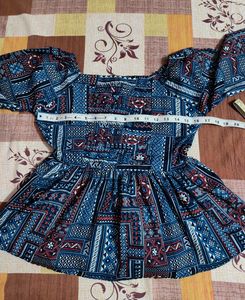 Patterned Peplum Top