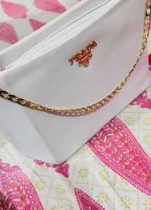 Sling white color bag...with chain