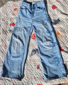 Wide Leg Jeans with Bow Detail