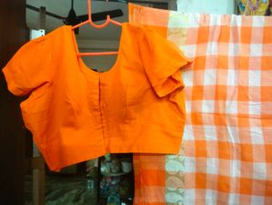 Orange Saree With Matching Blouse.