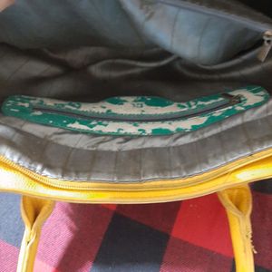 Diana Korr mustard coloured bag