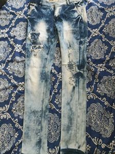 Distressed Blue Denim Jeans