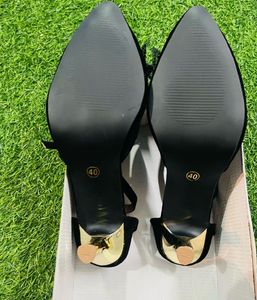 Chic Black Heels with Bow Detail