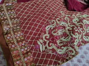 Elegant Maroon Embroidered Saree With Blouse