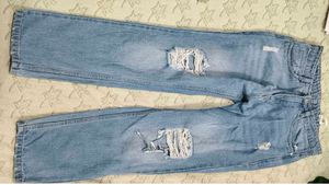 Ripped Blue Denim Jeans