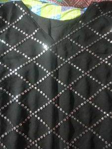 black kurti and dupatta.