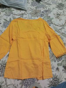 Branded Yellow Short Kurti Type Top.