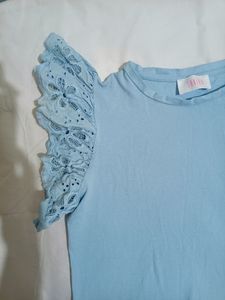 Embroidered Ruffle Trim Solid Top