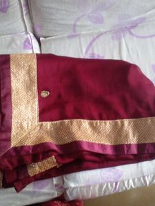 Elegant Maroon Saree with Gold Border