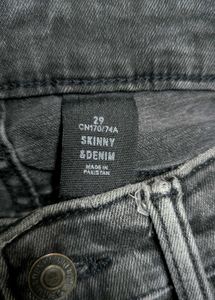Distressed Black Skinny Jeans