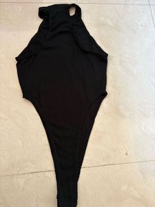Chic Black Ribbed Bodysuit
