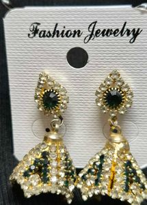green emerald-toned earrings