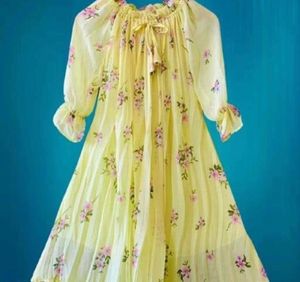 A flowing beautiful Yellow Color western dress