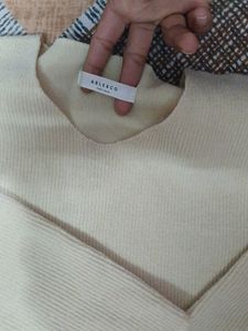 Top Woolen