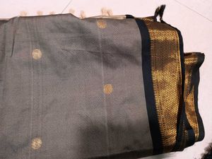 Beige Colour Saree With black &amp; Golden Border.