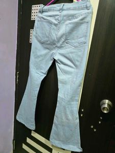 Women Ripped Flare Leg Jeans