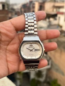 Orient Automatic Watch ( Need service )