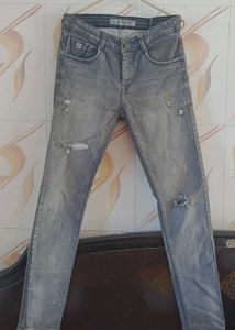 Distressed Gray Denim Jeans