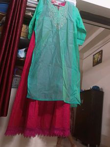 Pink Sleeveless Dress With Green Kurta On Top