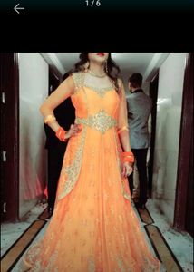 A Beautiful Party Wear Oranga Gown