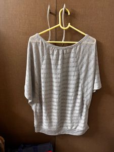 Gray Knit top with cut out design