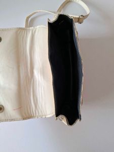 Light Pink Handbag and cream Slingbag