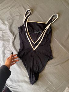 chic black bodysuit top