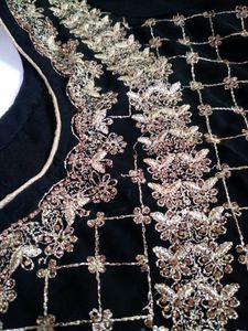 GORGEOUS BLACK AND GOLDEN SUIT