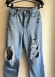 Ripped Denim Jeans with Butterfly Embroidery