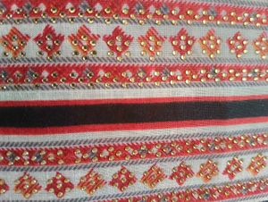 Striped Textile with Embellishments
