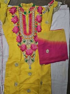 Yellow Kurti With Pink Embroidery