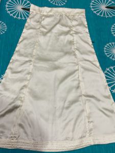 Underskirt Of Saree Or Peticoat Cream Shiny Colour