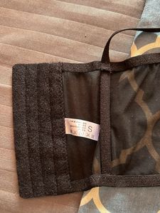 Elegant embroidered net corset.