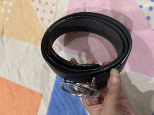 A black belt with silver buckle