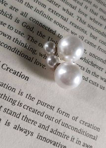 pearl stud earrings.