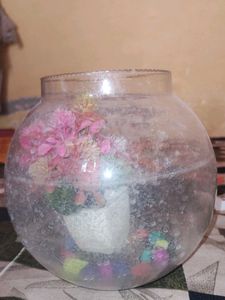 This Is Fish Tank And Flowers Inside