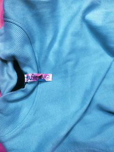 Sleeveless Turtleneck Top