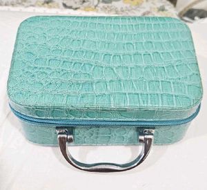 Teal Croc-Embossed Travel Jewelry Case