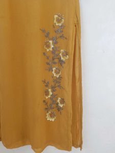 Hand Floral Embroidered Kurta pant set .