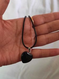 Black Heard Shaped Pendant And Faux Leather Chair